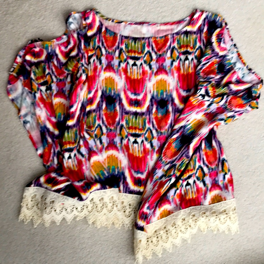 Boxy cape or cold shoulder blouse